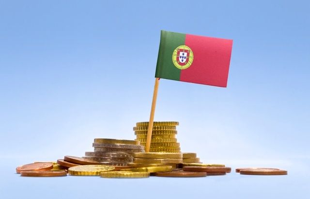 Investors eye Portuguese government bonds after rating upgrade