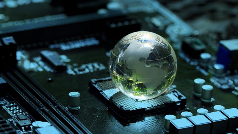 Concept of green technology. crystal globe on circuit board technology innovations. Environment Green Technology Computer Chip.Green Computing and Technology, CSR, and IT ethics, Ai.